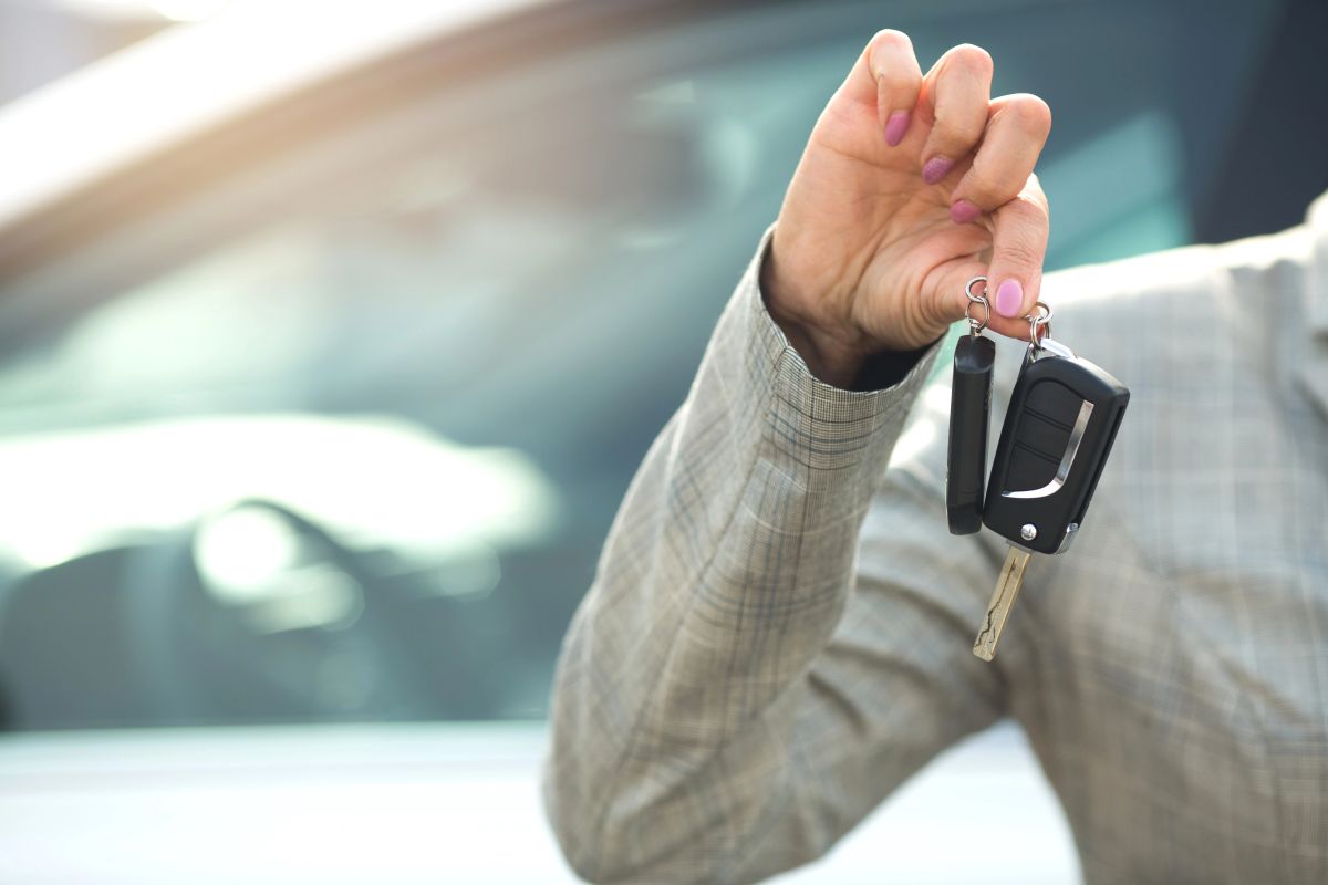 Woman Holding Car Keys After Getting an Auto Title Bond in Houston, TX