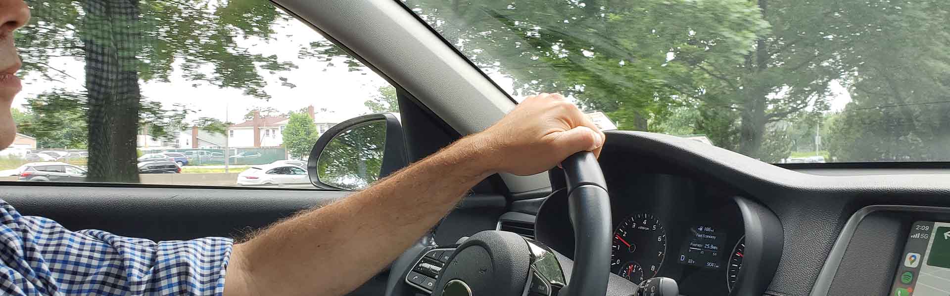 Man driving a car for auto title bonds in Conroe, TX